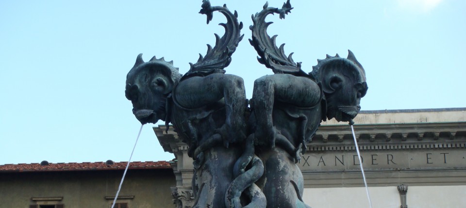 Sea creature detail of the bronze fountain in the Piazza della Santissima Annunziata, Florence, Italy