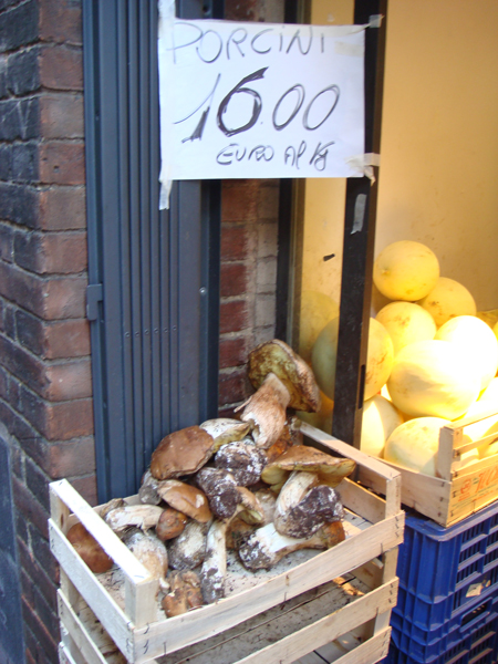 Day 3 Photo- Porcini mushrooms outside a market doorway