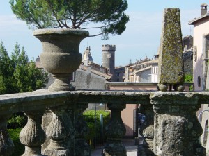 Day 8 Photo- looking over a railing at Villa Lante toward the clock tower in Bagnaia.